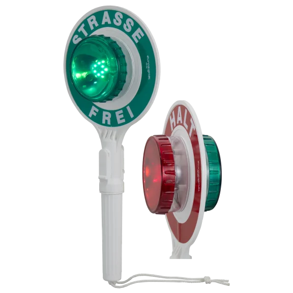 Winkerkelle mit beidseitiger LED-Beleuchtung – grüne Seite mit Aufschrift „STRASSE FREI“, rote Seite mit „HALT“, jeweils mit großer Leuchtlinse in der Mitte.