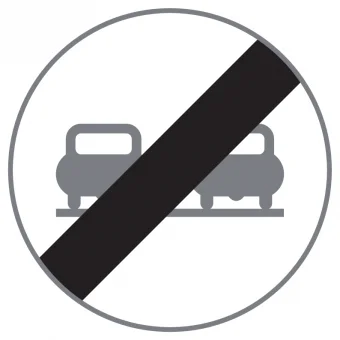 Ende des Überholverbotes. Verkehrszeichen mit zwei grauen Autos, diagonal durchgestrichen mit schwarzem Balken 