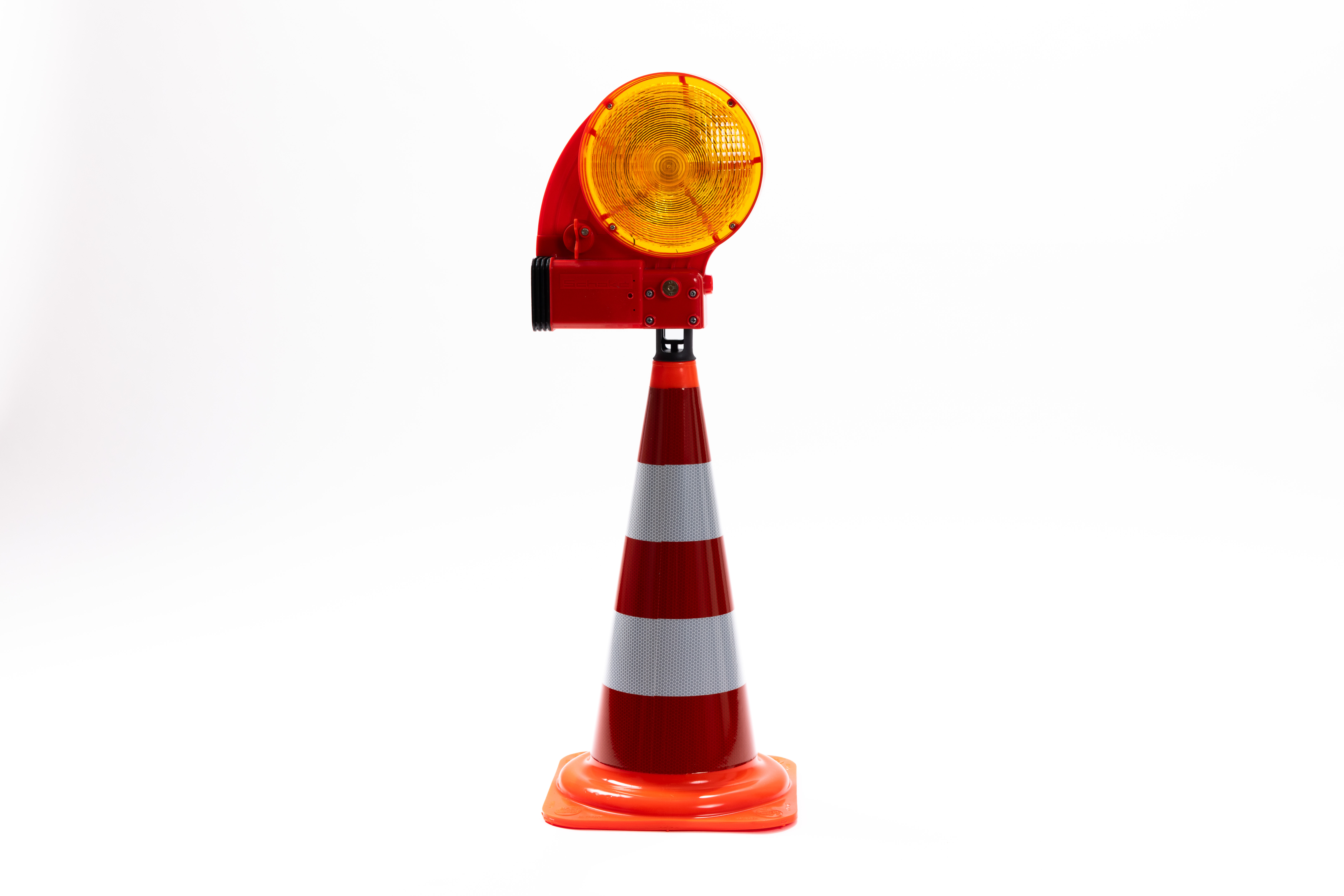 Leitkegel mit seitlicher NOX Blitzleuchte – Verkehrsleitkegel mit Warnlicht Leitkegel mit retroreflektierenden Streifen und seitlich montierter NOX Blitzleuchte zur mobilen Absicherung im Straßenverkehr.