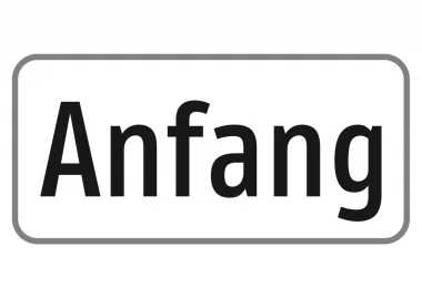 Zusatztafel mit schwarzer Aufschrift „Anfang“ auf weißem Hintergrund und schwarzem Rahmen