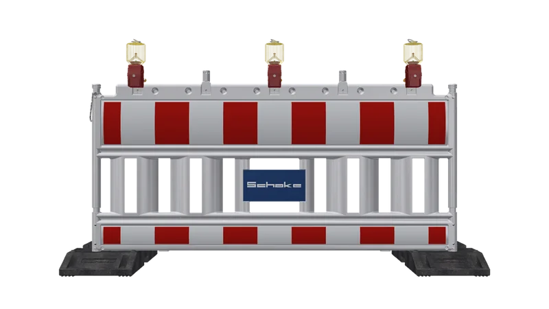 Bauzaunlampe mit orangen Glas Montiert auf einer absperrung